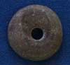 Spindle whorl from Filkins, Oxfordshire (AN1909.497c)