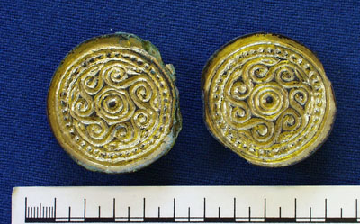 Saucer brooches